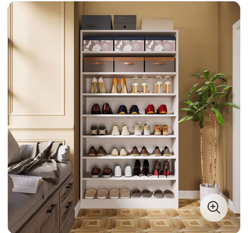 Spacious white shoe storage cabinet with multiple shelves.