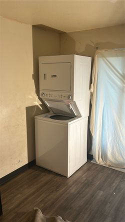 White Stacked Washer and Dryer Unit