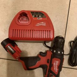 Milwaukee Drill And Battery And Charger 