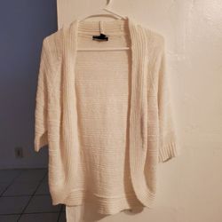 Beautiful White Sweater Can Wear During The Summer At The Beach For Sun Protection