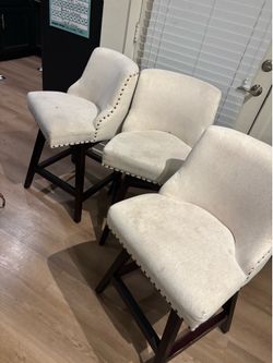 Three barstool chairs