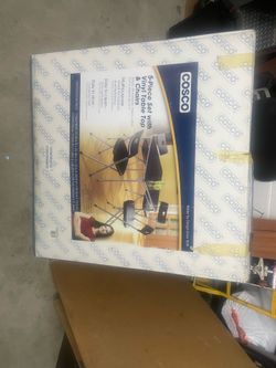 Folding table and 4 chairs.  Like new