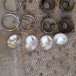 1963 Impala Head Lights Buckets And Retainers  OG 
