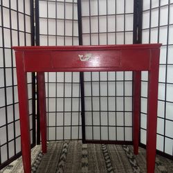 Bright red entry table