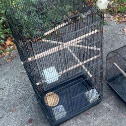Two Bird Cages.