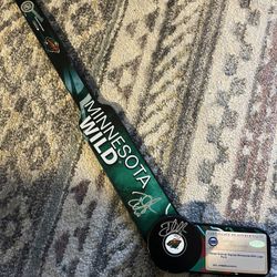 Devan Dubnyk Autographed Mini Goalie Stick and Hockey Puck with COA 