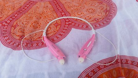 Bluetooth neckband sport earbuds with mic.