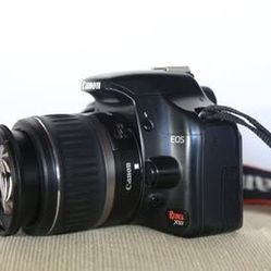 Canon Rebel XSi digital SLR camera with EF-S 18-55mm f/3.5-5.6 IS lens, charger,  battery, SD card