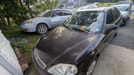 TRADE 2 for 1 Honda Civics '00 & '99.