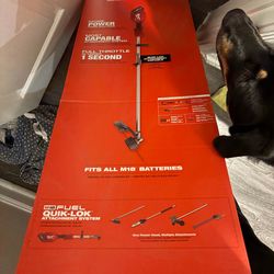 Milwaukee M18 FUEL combo kit 16” string trimmer + blower.