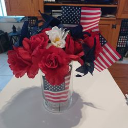 New 4th of July Flower Arrangement in clear case. Red, white, Blue American flag. $5