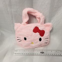 Hello, Kitty plush, purse.