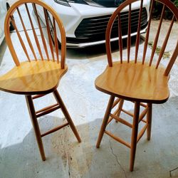Two oakwood Bar Stools Seats swivel.
