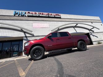 Dodge Ram 1500 wheels tires leveling & lift kits accessories side steps bed covers intakes installations. Alignments. (We Finance)