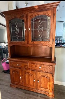 Solid wood buffer hutch also has lights