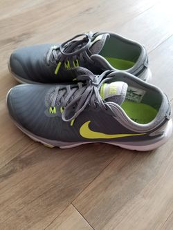 Nike sports shoes size 5.5 very less worn with box.