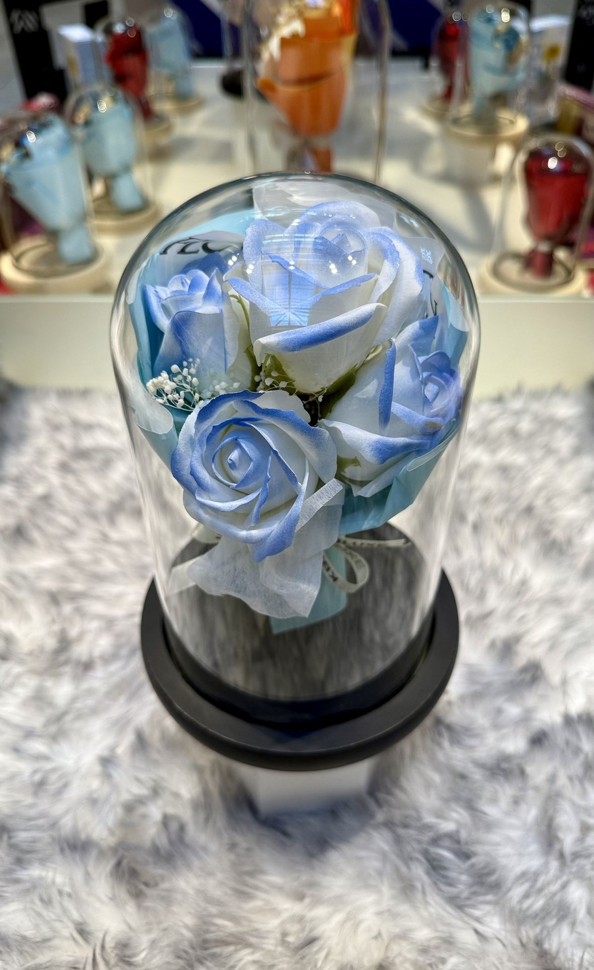 Preserved Soap Flower bouquet In Glass Bottle