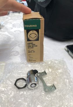 Harley Davidson fuel door push button release