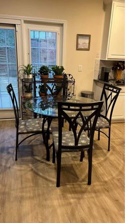 42” Round Glass Dining Table with 4 Chairs – $200