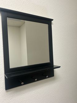 Mirror with hooks Mirror with hooks