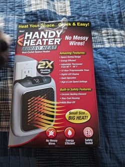 Never Used Handy Heater Wall Outlet Space Heayer
