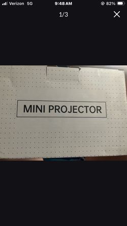 Mini projector with screen