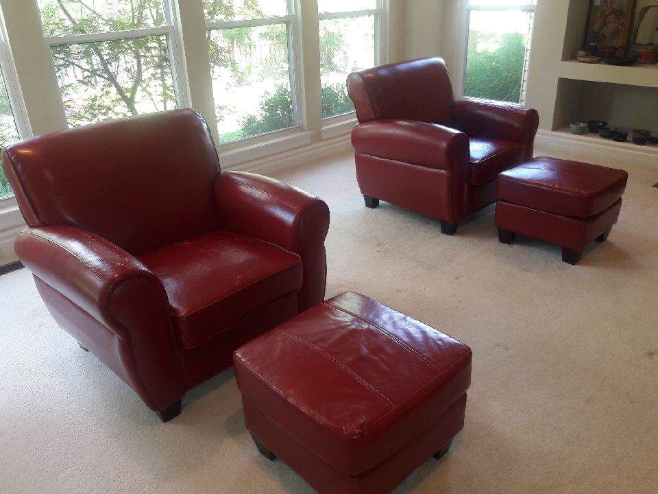 2 Red Matching leather chairs with 2 red ottomans