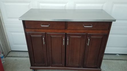 Stainless and wood rolling server