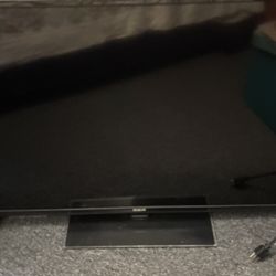 Used RCA 42 inch flatscreen TV with brand new still in box Roku express high definition streaming box Pick Up Only 