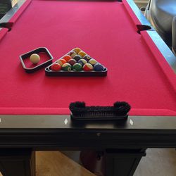 4 x 7 slate top pool table with balls eight ball nine ball brush, six pool stick and holder