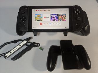 Nintendo switch + 256gb and 2 games + accessories 


