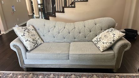 Gray Tufted  Sofa with Accent Pillows