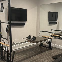 Stott Pilates reformer and tower gym equipment