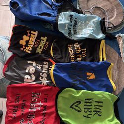 Small Dog T Shirts And A Blue Carrier 