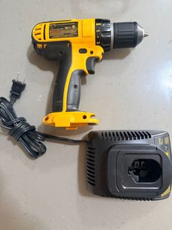 DeWalt DC742 12V cordless drill with charger. No battery.
