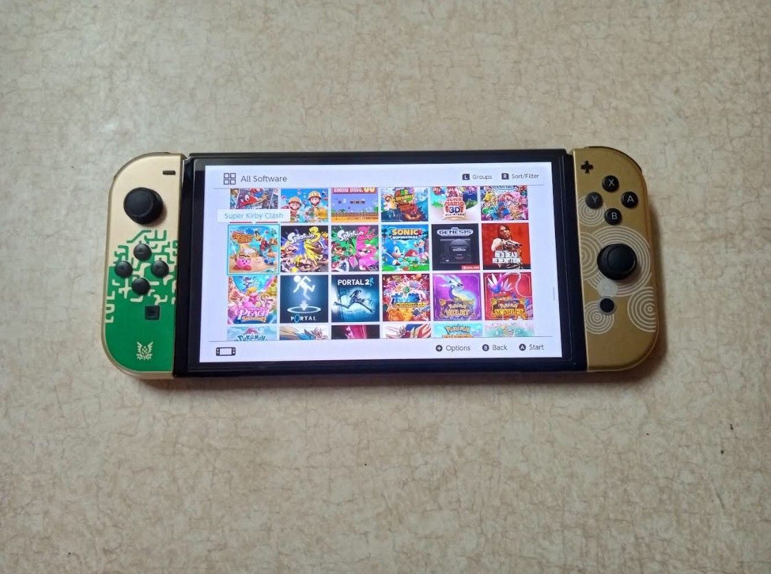 NINTENDO SWITCH OLED with 100 POPULAR GAMES