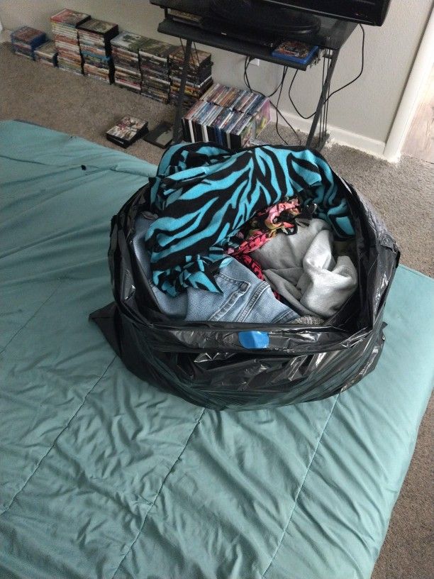 Big Bag Of Different Sized Women's Clothes