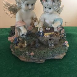 Noah’s ark I’d like to teach the world to sing cherub angel musical figurine