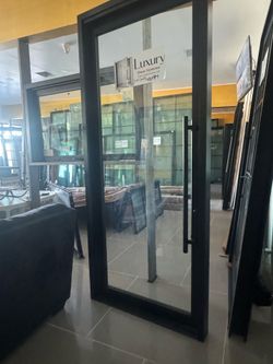In swing black self closing glass door 40x96