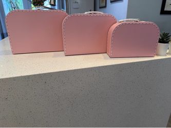Pink small suitcase