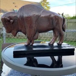 The classic brown buffalo statue