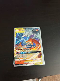 Reshiram and charizard gx tag team Pokémon card