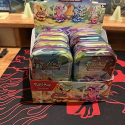 Prismatic Evolutions Mini Tin Display