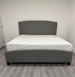 Beautiful Gray King size bed frame, mattress and boxspring included for free. Delivery available for an additional cost.