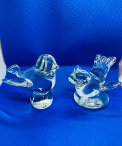 Vintage clear glass hand sculpted bird figurines in two poses