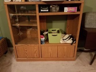 Entertainment cabinet; t.v. cabinet; 52 wide; 49 tall; 18 in deep (from back to front); tv slot 28 in wide, 23 in tall - $40