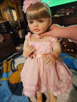 Beautiful vinyl doll,new.