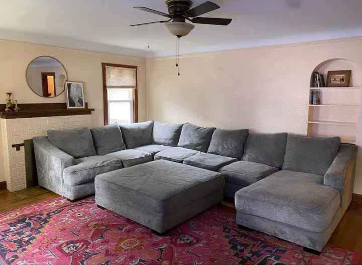 Gray sectional with ottoman