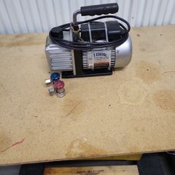 ac vacuum  pump and ac quick  coupler .