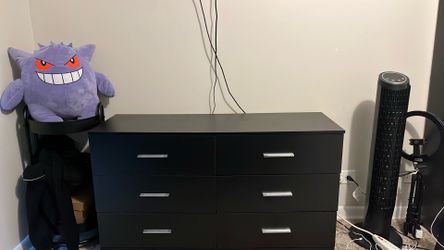 black and silver dresser